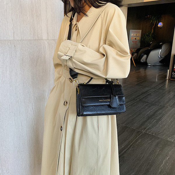 Új modell bőr kézitáska hosszú és rövid fülekkel, piros, fekete és zöld színben