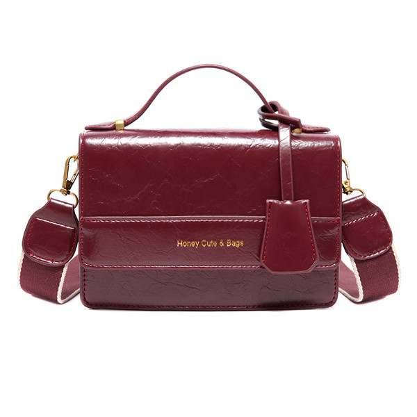 Új modell bőr kézitáska hosszú és rövid fülekkel, piros, fekete és zöld színben