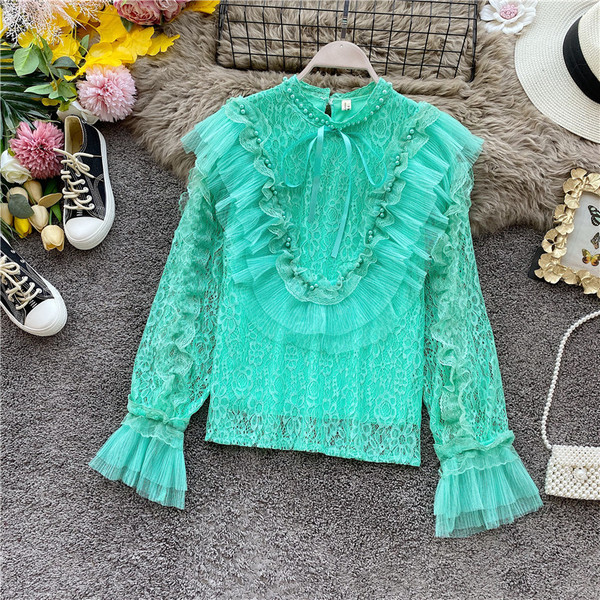 Stílusos női ing gyöngyökkel és nyakkendőkkel fehér, rózsaszín, zöld és fekete színekben