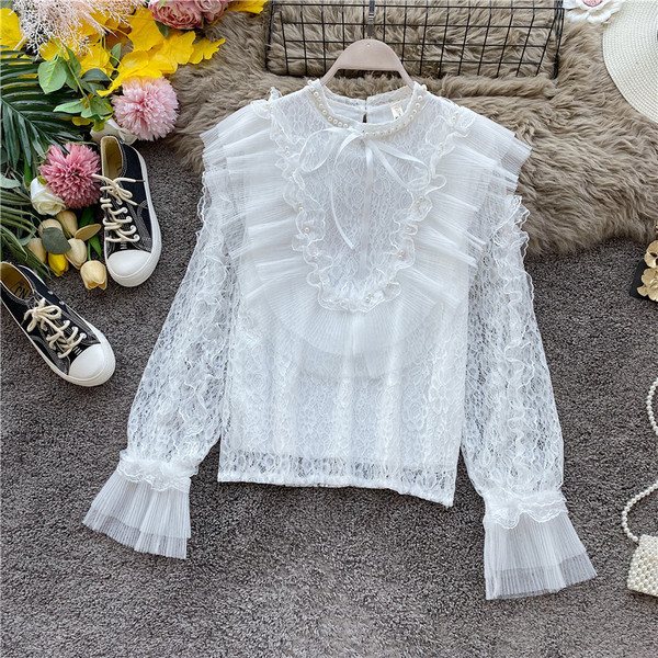 Stílusos női ing gyöngyökkel és nyakkendőkkel fehér, rózsaszín, zöld és fekete színekben