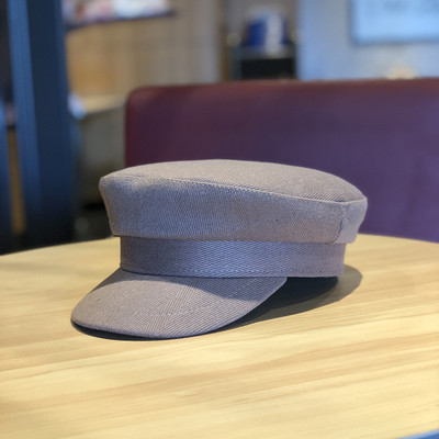 Női téli sapka típusú sapka fekete, barna, piros és szürke színben