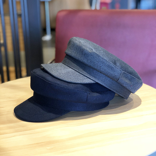 Női téli sapka típusú sapka fekete, barna, piros és szürke színben