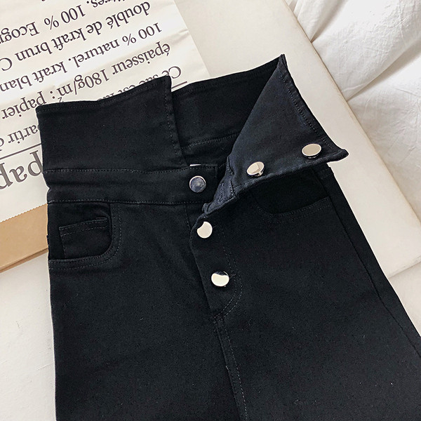 Modern női nadrág magas derékkal, fekete gombokkal