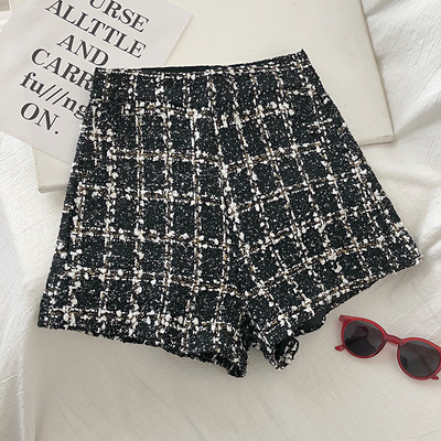 Modern női magas derekú nadrág fekete és arany színben