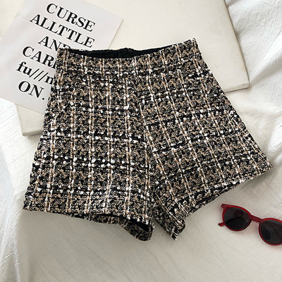 Modern női magas derekú nadrág fekete és arany színben