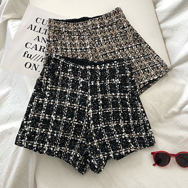 Modern női magas derekú nadrág fekete és arany színben