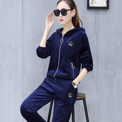 ÚJ modell kétrészes női téli szett cipzárral és kapucnival kék és fekete színben