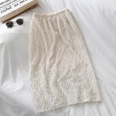 Modern női szoknya magas derékkal és bojttal bézs és fekete színben