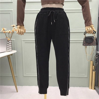 Νέο μοντέλο αθλητικό παντελόνι με τσέπες και φερμουάρ σε λευκό και μαύρο χρώμα