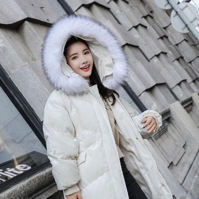 Ζεστό χειμωνιάτικο μακρύ γυναικείο μπουφάν με κουκούλα σε μπλε και άσπρο χρώμα