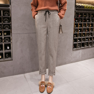 Alkalmi női nadrág szürke és bézs színben, magas derékkal és megkötővel