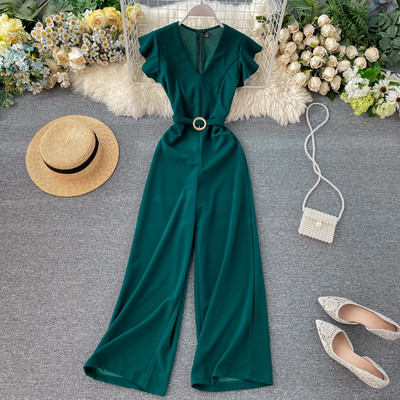 Női hosszú jumpsuit övvel és V-nyakú bordó, kék, zöld, fekete és szürke színekben