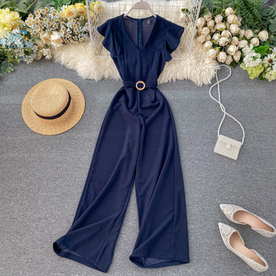 Női hosszú jumpsuit övvel és V-nyakú bordó, kék, zöld, fekete és szürke színekben