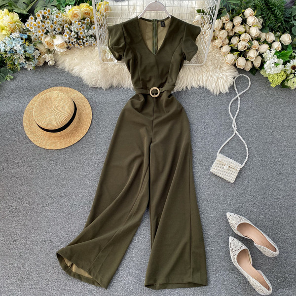 Női hosszú jumpsuit övvel és V-nyakú bordó, kék, zöld, fekete és szürke színekben