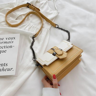 Μικρή οικολογική δερμάτινη τσάντα με λαβή ώμου σε κίτρινο, πράσινο, μαύρο και άσπρο χρώμα