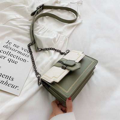 Μικρή οικολογική δερμάτινη τσάντα με λαβή ώμου σε κίτρινο, πράσινο, μαύρο και άσπρο χρώμα