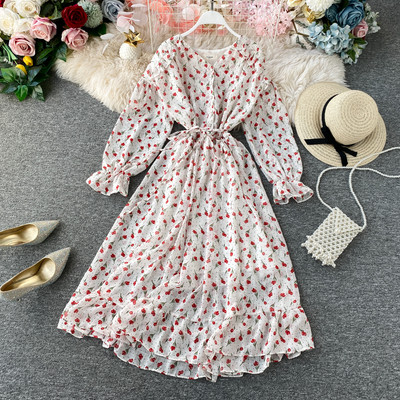 Rochie moderna de dama cu nasturi si model floral in alb, galben, albastru si roz