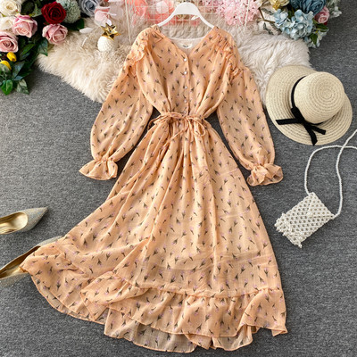 Rochie moderna de dama cu nasturi si model floral in alb, galben, albastru si roz