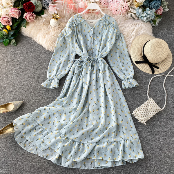 Rochie moderna de dama cu nasturi si model floral in alb, galben, albastru si roz