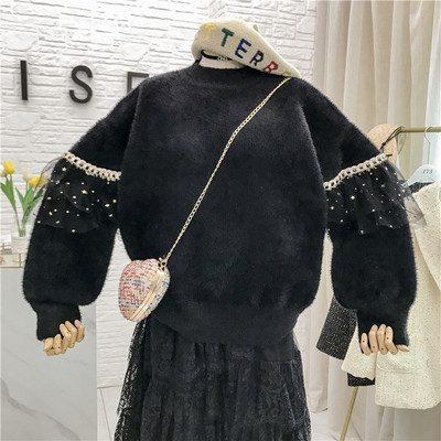 Νέο μοντέλο γυναικείο μαλακό πουλόβερ με στρογγυλη λαιμόκοψη και τούλι σε λευκό και μαύρο χρώμα