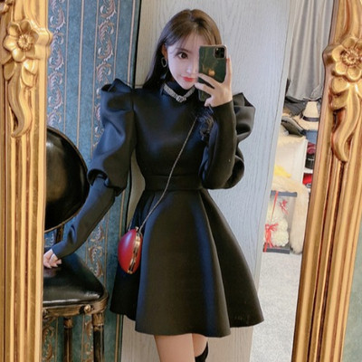 Μοντέρνο γυναικέιο φόρεμα σε κόκκινο και μαύρο χρώμα με φαρδιά μανίκια