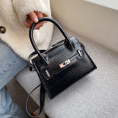 Geanta de dama moderna din piele ecologica cu doua manere in negru, rosu si maro