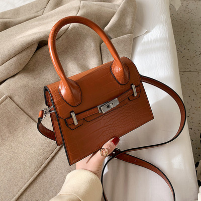 Geanta de dama moderna din piele ecologica cu doua manere in negru, rosu si maro