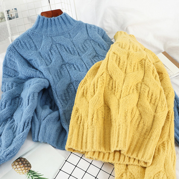 Γυναικείο πουλόβερ σε κίτρινο, μπλε και άσπρο χρώμα  με υψηλό κολάρο και μακρύ μανίκι