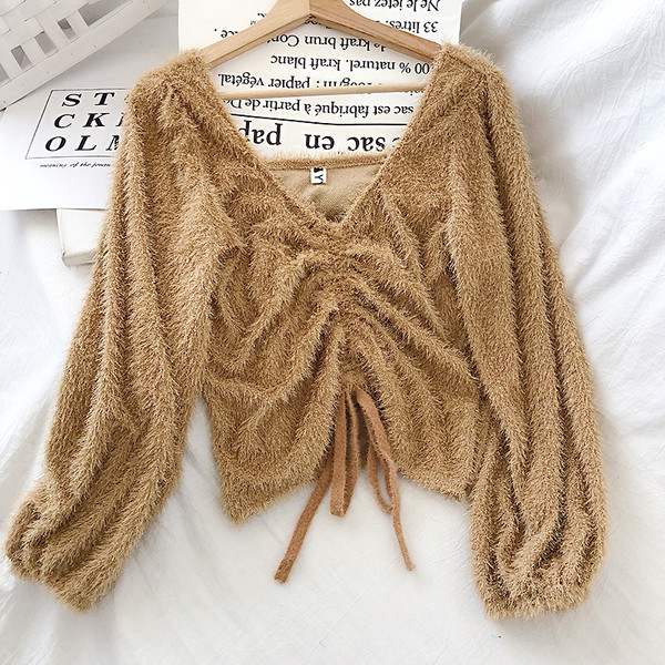 Γυναικείο πουλόβερ σε μαύρο, λευκό και μπεζ  χρώμα με κορδόνια και V-neck