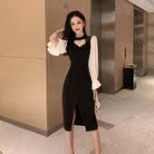 Női ruha spitz nyakkivágással, hasítékos és lótusz ujjú fekete színben