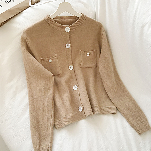 Női kardigán négy színben kerek nyakkivágással és zsebbel