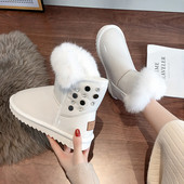 Γυναικείες χειμωνιάτικες μπότες με μαλακή επένδυση σε μαύρο και άσπρο χρώμα