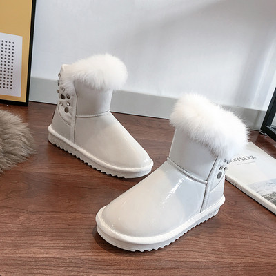 Γυναικείες χειμωνιάτικες μπότες με μαλακή επένδυση σε μαύρο και άσπρο χρώμα