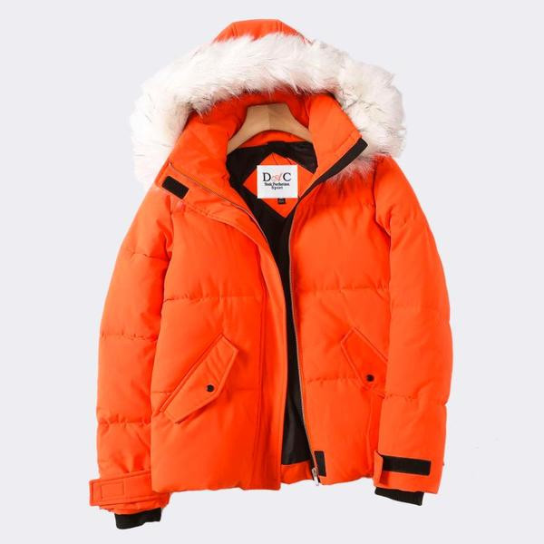 Vastag téli kabát cipzárral és kapucnival narancssárga pehelyszínnel