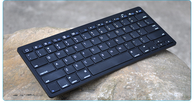 Tastatură fără fir Bluetooth cu un design subțire și 78 de taste alb-negru