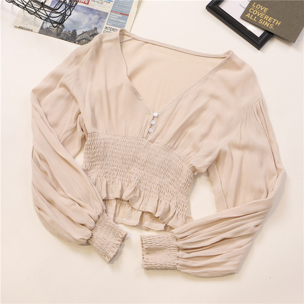 Κομψή γυναικεία μπλούζα σε διάφορα χρώματα με V-λαιμόκοψη και κουμπιά