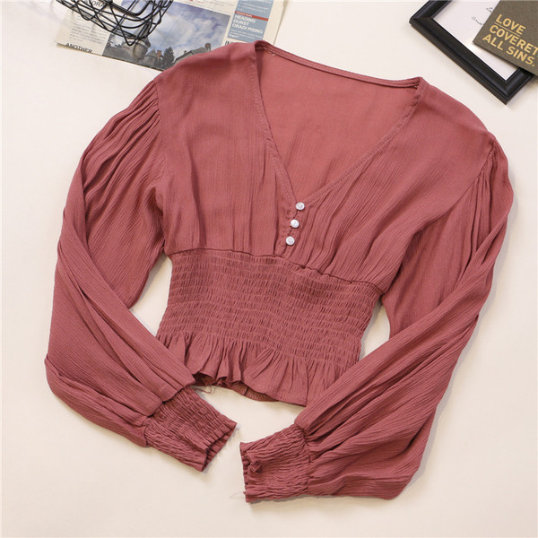 Κομψή γυναικεία μπλούζα σε διάφορα χρώματα με V-λαιμόκοψη και κουμπιά