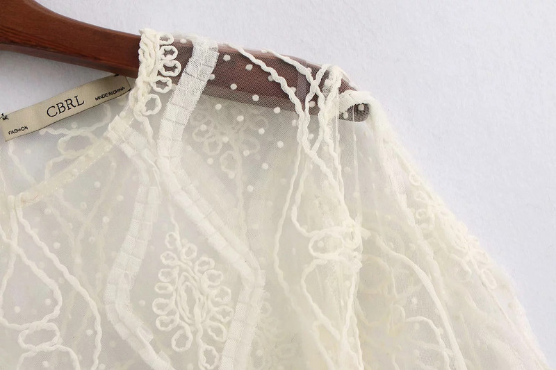 Női átlátszó blúz tüllből és csipkéből, fehér színben