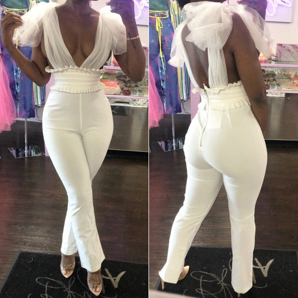 Elegáns női hosszú jumpsuit mély nyakkivágással és pántokkal fehér és fekete színben