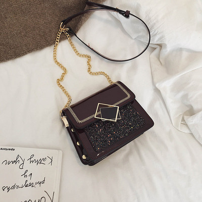 Geantă modernă mică din piele artificială cu curea de umăr cu cataramă metalică în culorile maro, verde, visiniu și negru