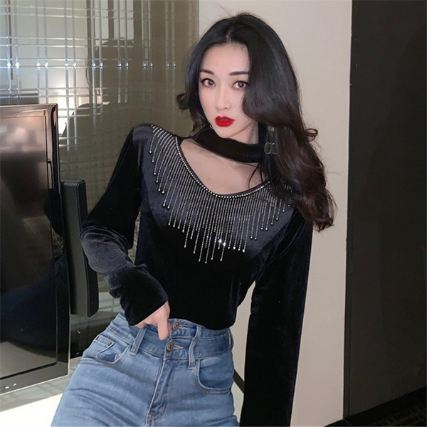 Modern női blúz fekete színben kövekkel és hosszú ujjal