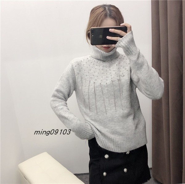 Γυναικείο πουλόβερ με κολάρο και με κρόσσια και διακόσμηση πέτρες σε γκρι χρώμα