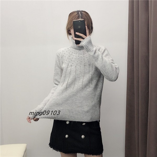 Γυναικείο πουλόβερ με κολάρο και με κρόσσια και διακόσμηση πέτρες σε γκρι χρώμα