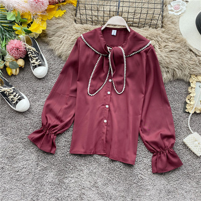 Modern női ing gombokkal és gyöngyökkel fekete, barna, fehér és bordó színben