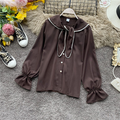 Modern női ing gombokkal és gyöngyökkel fekete, barna, fehér és bordó színben