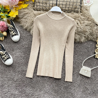 Divatos női pulóver vékony kötésből, magas gallérral, különböző színekben