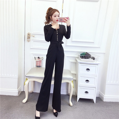 Új modell női hosszú overall spitz nyakkivágással, gombokkal és övvel kék és fekete színben