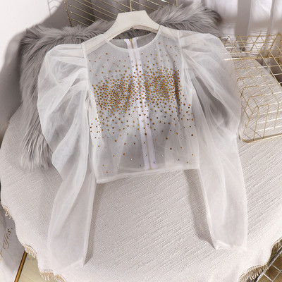 Μοντέρνα γυναικεία μπλούζα από τούλι με φερμουάρ και πέτρες σε κόκκινο, μπεζ, λευκό και μαύρο χρώμα