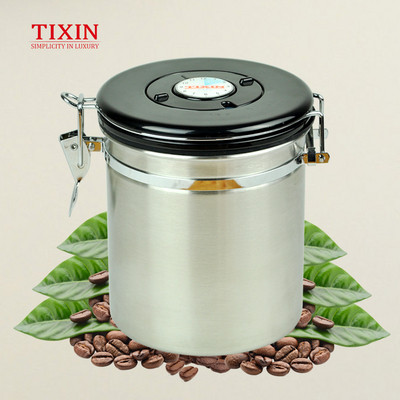 Rozsdamentes acél doboz tetővel, amely alkalmas tea, kávé és gabonafélék tárolására piros, sárga és szürke színben