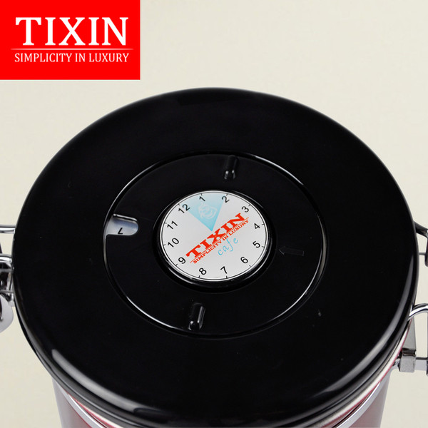 Rozsdamentes acél doboz tetővel, amely alkalmas tea, kávé és gabonafélék tárolására piros, sárga és szürke színben